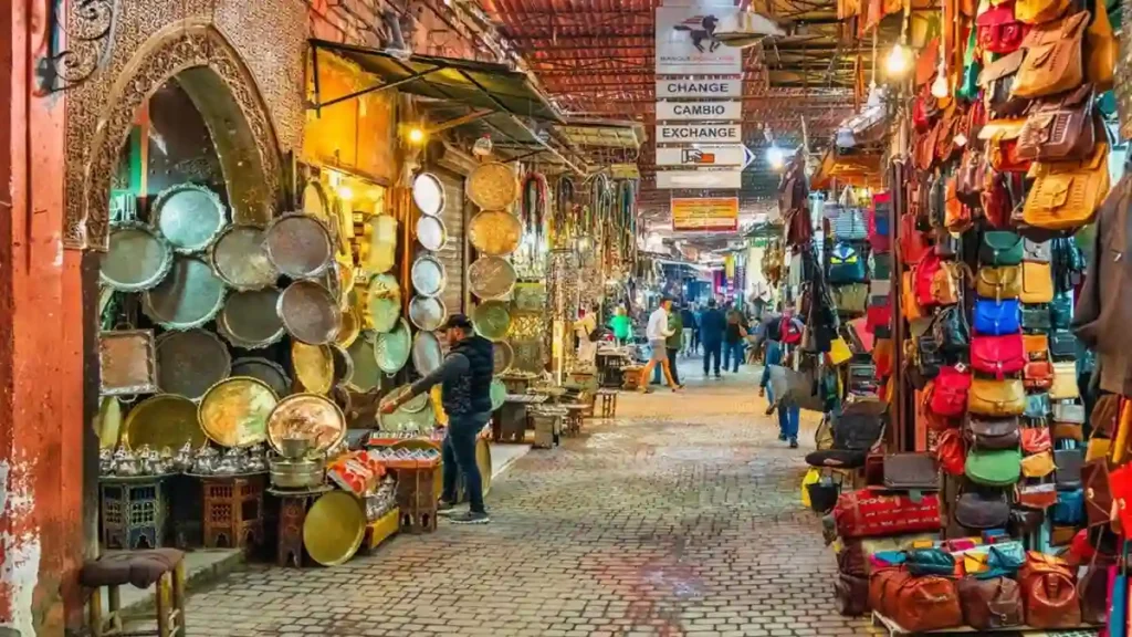 Different craft shops grouped together in the Marrakech souks showing how the medina markets are organized