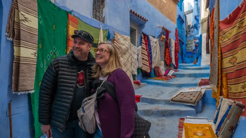 Is Morocco safe for tourists - tourists walking safely in chefchaouen morocco blue city