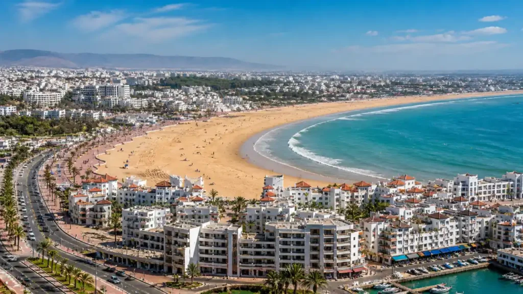 Agadir Beach Morocco wide sandy bay with coastal city and Atlantic ocean