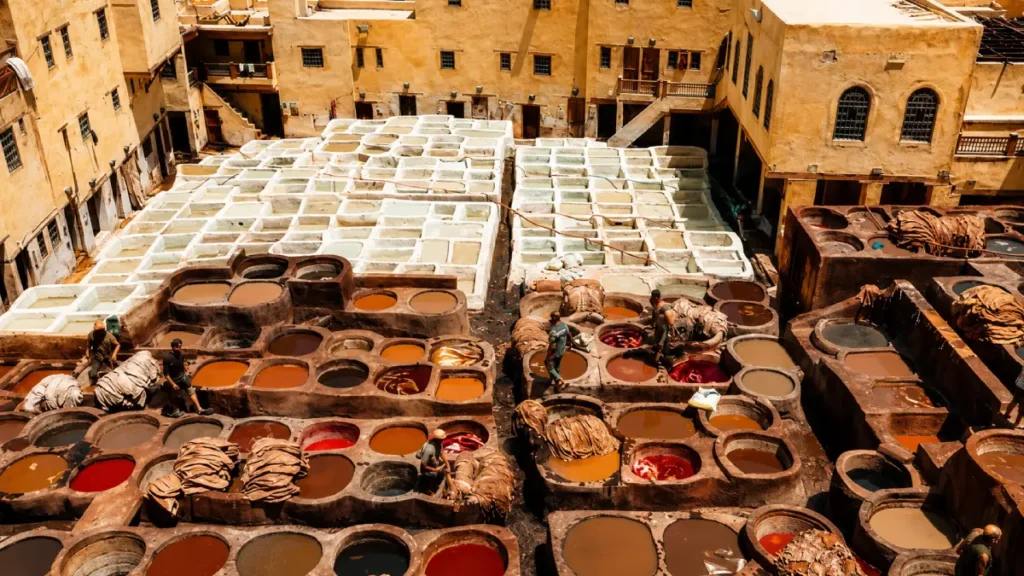 Fes leather tanneries in Morocco with colorful dye vats inside the old medina