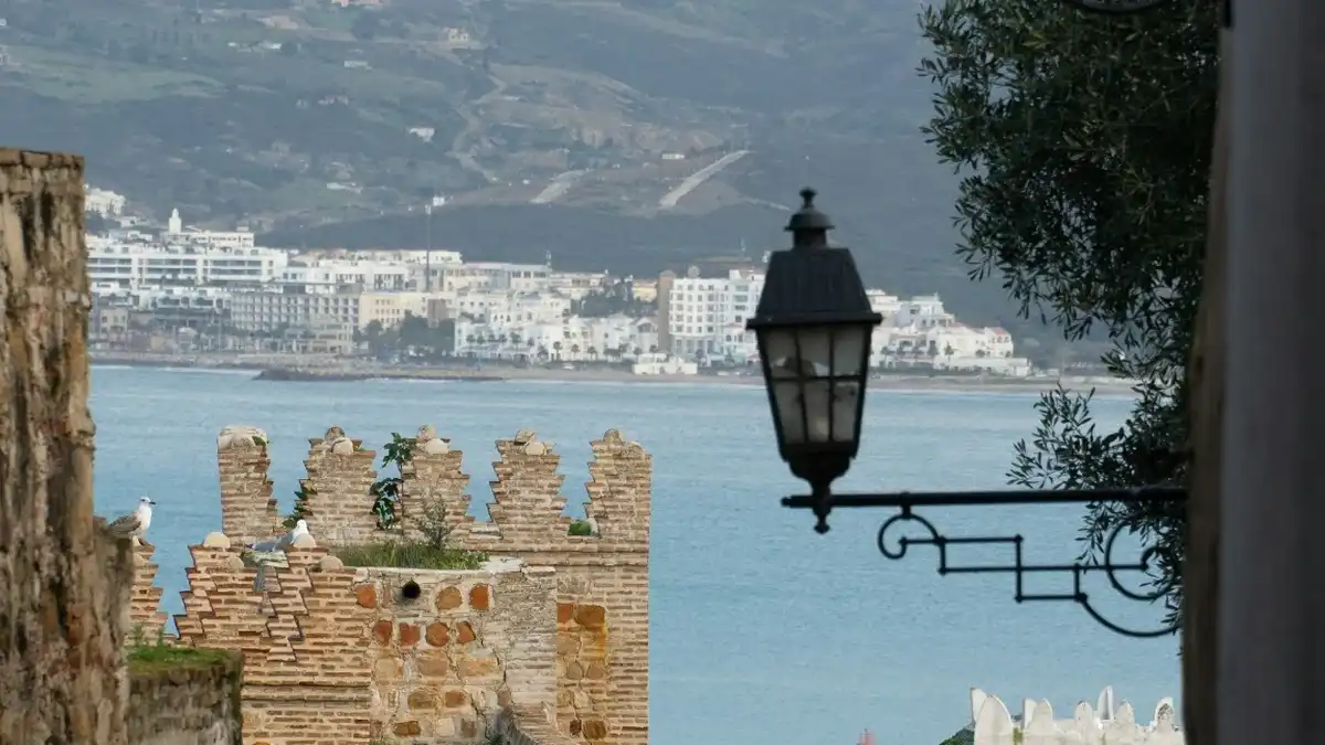 Tangier travel guide with Kasbah walls and coastal city view