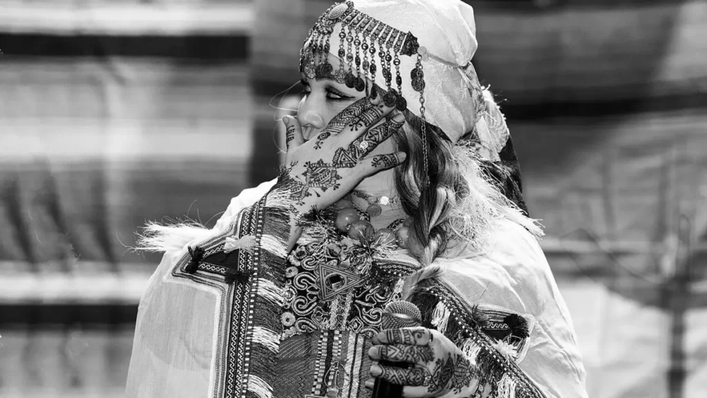 Woman wearing traditional Amazigh clothing and jewelry in Morocco