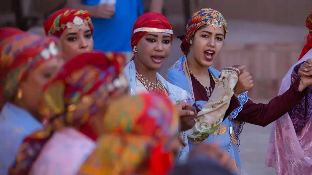 Amazigh women in traditional clothing during a cultural celebration in Morocco