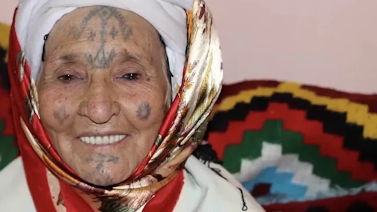 Berber tattoos in Morocco: portrait showing forehead, cheek and chin markings