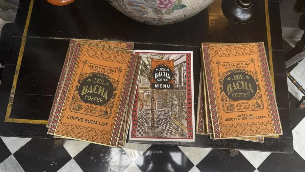 Bacha Coffee food menu and coffee selection booklets displayed on a table