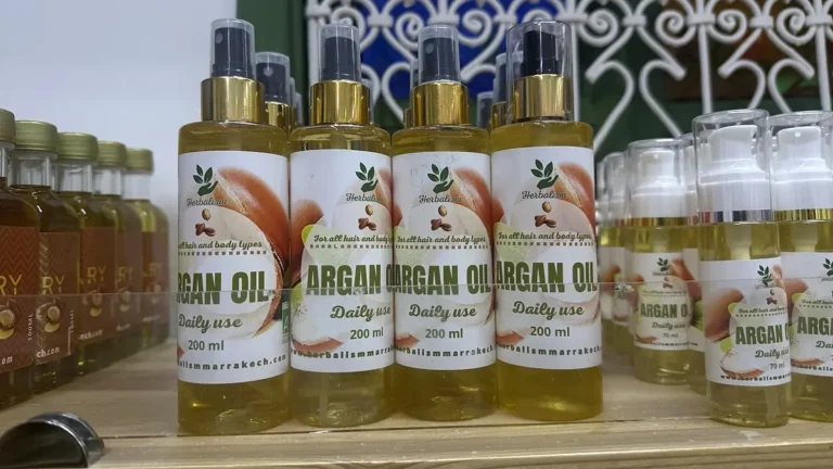 Buying argan oil in Marrakech: labeled bottles displayed on a shop shelf