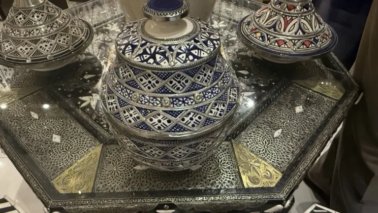 Buying ceramics in Marrakech: patterned ceramic jars displayed in a shop