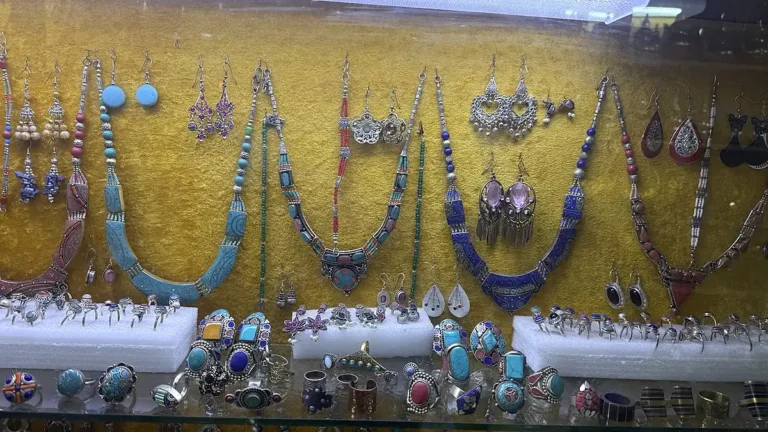 Buying silver jewelry in Marrakech: necklaces, earrings and rings on display