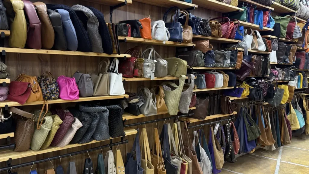 Handbags and shoulder bags displayed inside a Marrakech leather shop