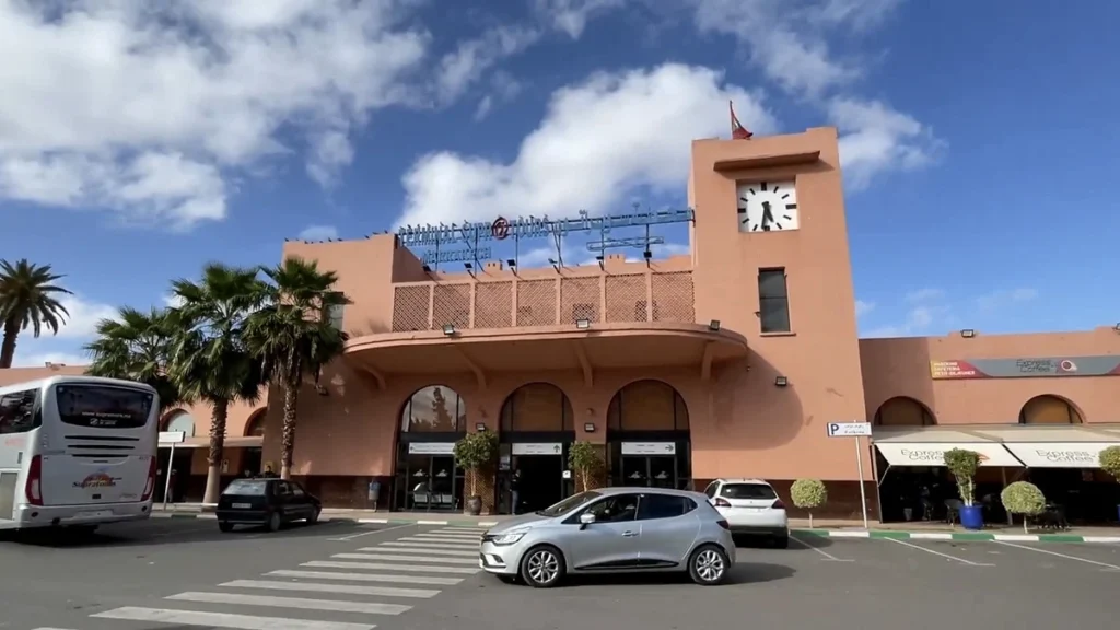 Supratours Marrakech station entrance with a clock tower
